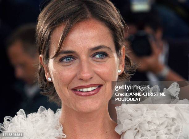 Actress Leonor Silveira poses for photographers at the Palais des festivals during the photocall for Portuguese director Manoel de Oliveira's film 'O...