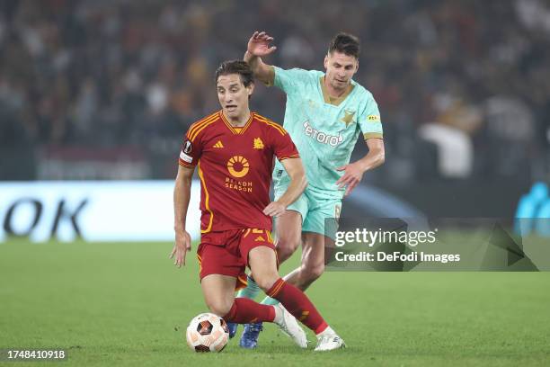 Edoardo Bove of AS Roma and Lukas Masopust of Slavia Praha battle for the ball during the UEFA Europa League 2023/24 match between AS Roma and SK...