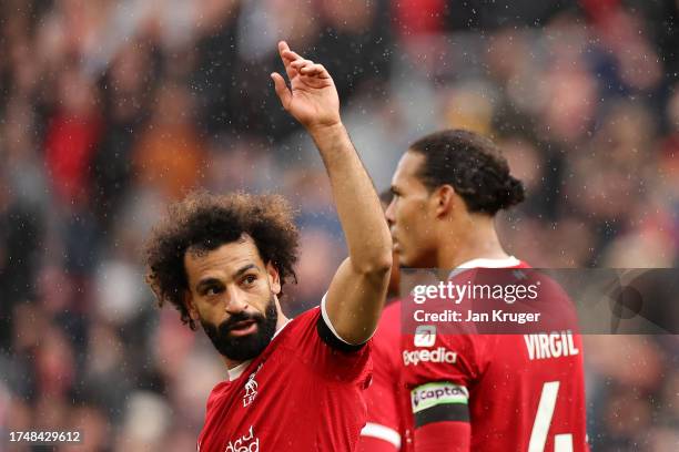 Mohamed Salah of Liverpool celebrates after scoring the team's second goal during the Premier League match between Liverpool FC and Everton FC at...