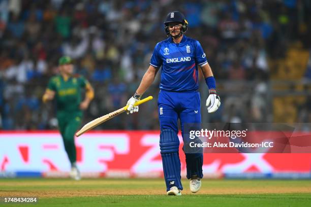 Joe Root of England leaves the field after being dismissed during the ICC Men's Cricket World Cup India 2023 match between England and South Africa...