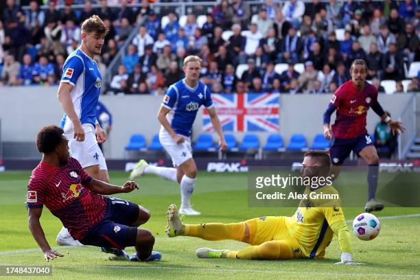 Lois Openda of RB Leipzig scores the team's first goal during the Bundesliga match between SV Darmstadt 98 and RB Leipzig at Merck-Stadion am...