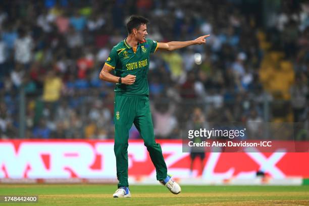 Marco Jansen of South Africa celebrates the wicket of Joe Root of England during the ICC Men's Cricket World Cup India 2023 match between England and...
