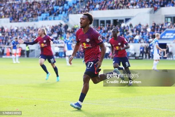 Lois Openda of RB Leipzig celebrates after scoring the team's first goal during the Bundesliga match between SV Darmstadt 98 and RB Leipzig at...