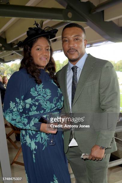 Danielle Isaie and Ashley Walters attend the QIPCO British Champions Day at Ascot Racecourse on October 21, 2023 in Ascot, England.