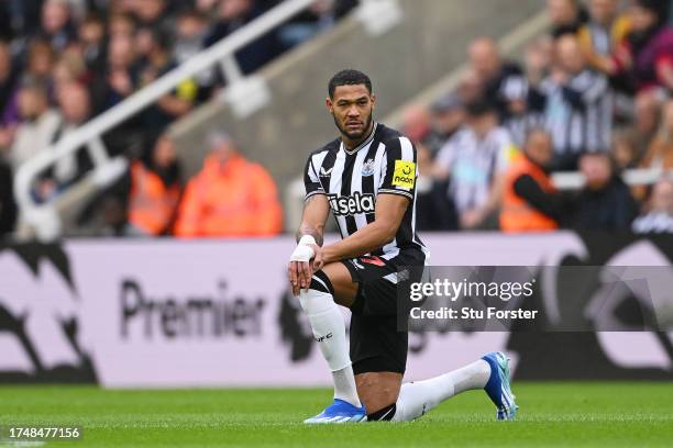 Joelinton of Newcastle United takes a knee prior to the Premier League match between Newcastle United and Crystal Palace at St. James Park on October...