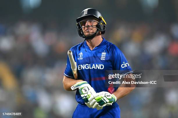 Jos Buttler of England reacts after being dismissed during the ICC Men's Cricket World Cup India 2023 match between England and South Africa at...