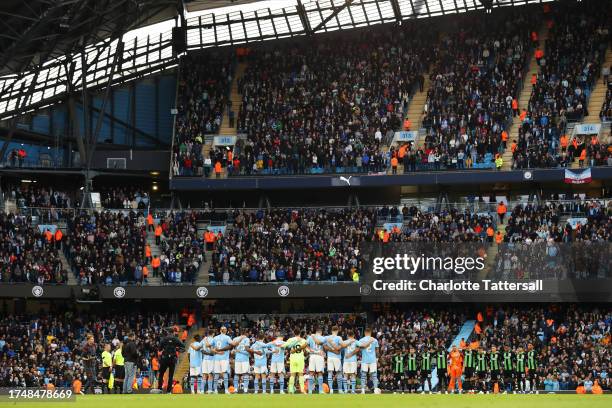 General view of the inside of the stadium as Players, fans and match officials observe a minutes silence in remembrance of the victims of the recent...