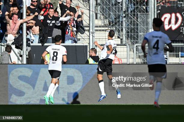 Ellyes Skhiri of Eintracht Frankfurt celebrates after scoring the team's third goal during the Bundesliga match between TSG Hoffenheim and Eintracht...