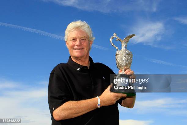 Mark Wiebe of the United States poses with the trophy after winning the play-off against Bernhard Langer of Germany after the final round of The...