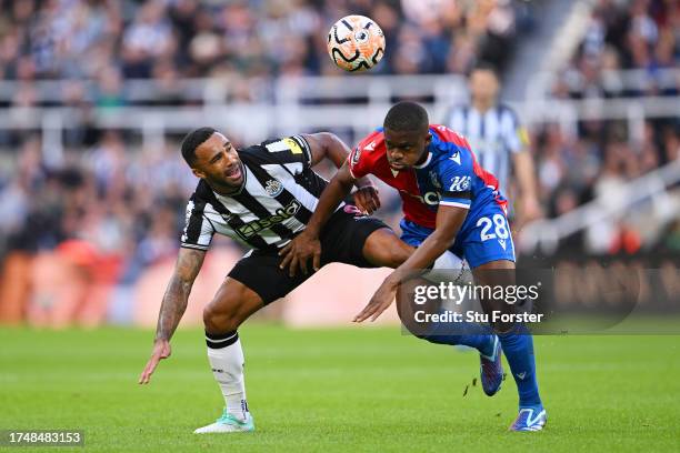 Callum Wilson of Newcastle United is challenged by Cheick Doucoure of Crystal Palace during the Premier League match between Newcastle United and...