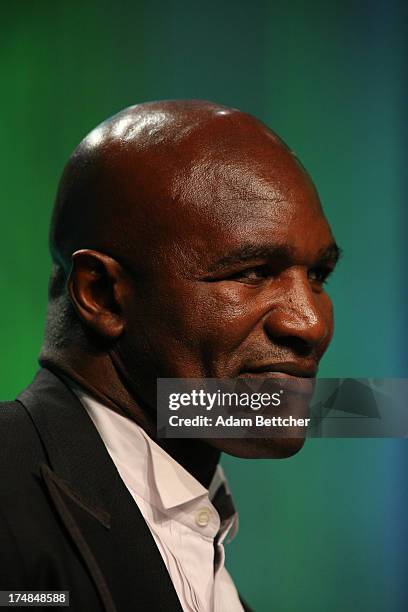 Evander Holyfield presents at the 2013 Starkey Hearing Foundation's "So the World May Hear" Awards Gala on July 28, 2013 in St. Paul, Minnesota.