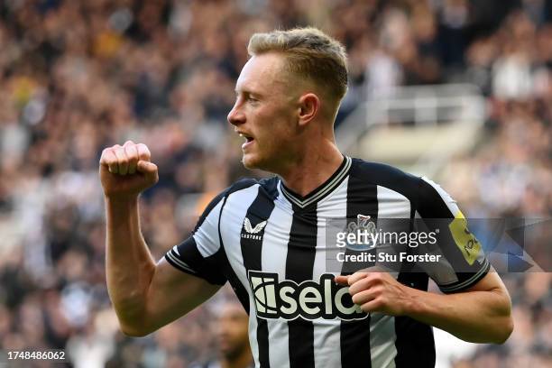 Sean Longstaff of Newcastle United celebrates after scoring the team's third goal during the Premier League match between Newcastle United and...