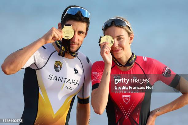 Leo Bergere of France and Cassandre Beaugrand of France pose for a photo with their me during the Super League Triathlon during the NEOM Beach Games...