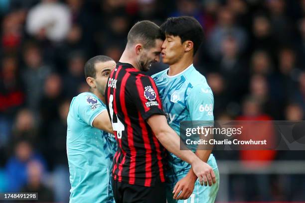 Lewis Cook of AFC Bournemouth clashes with Hwang Hee-Chan of Wolverhampton Wanderers, which later results in a red card for Lewis Cook, during the...