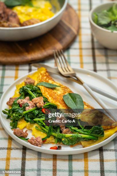 omelette with sausage and broccoli rabe - frittata stock pictures, royalty-free photos & images
