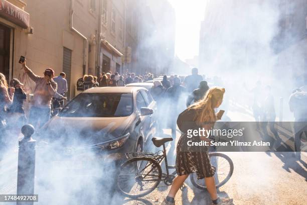 Police fire tear gas at demonstrators marching in support of Palestine on October 21, 2023 in Marseille, France. There has been an escalation in...