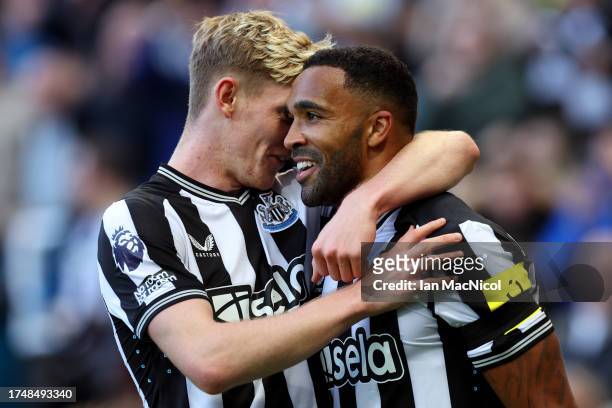 Callum Wilson of Newcastle United celebrates after scoring the team's fourth goal with teammate Anthony Gordon during the Premier League match...