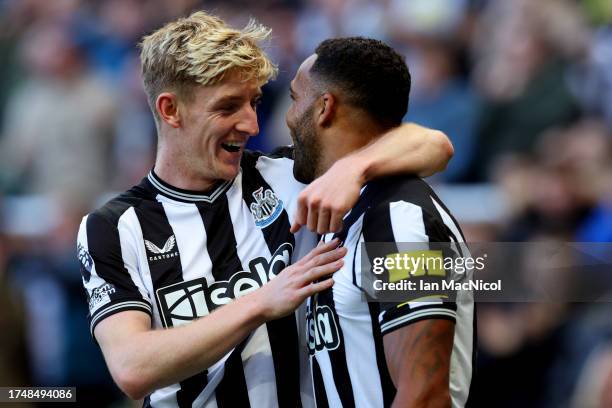 Callum Wilson of Newcastle United celebrates after scoring the team's fourth goal with teammate Anthony Gordon during the Premier League match...