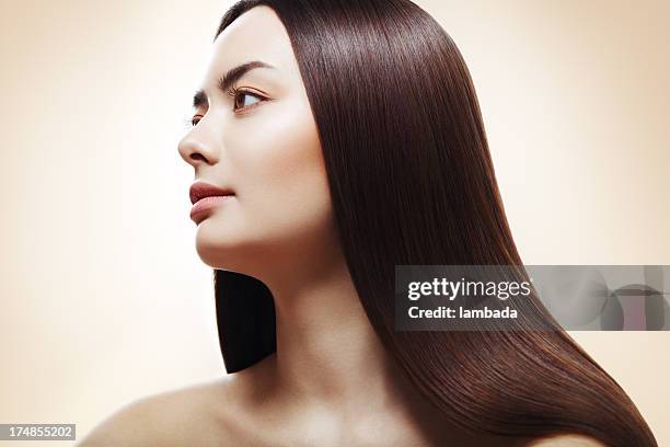 woman with perfect straight hair - long black hair stock pictures, royalty-free photos & images