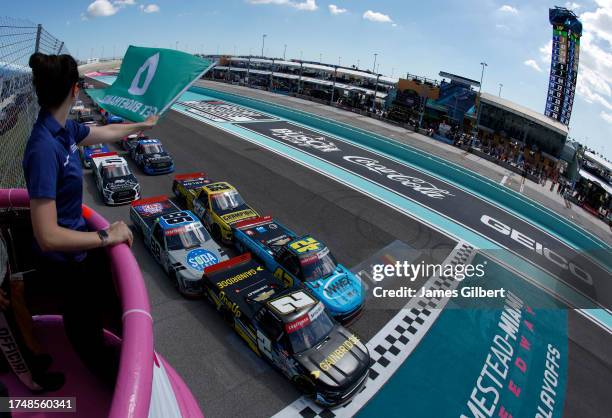 Nick Sanchez, driver of the Gainbridge Chevrolet, leads the field to the green flag to start the NASCAR Craftsman Truck Series Baptist Health Cancer...