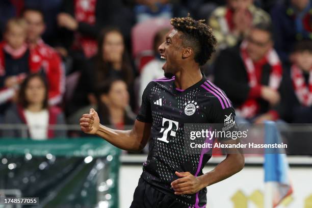 Kingsley Coman of Bayern Munich scores the team's first goal during the Bundesliga match between 1. FSV Mainz 05 and FC Bayern München at MEWA Arena...