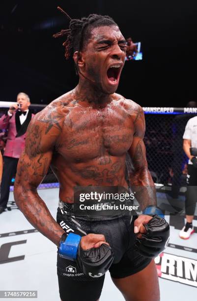 Sedriques Dumas reacts after his victory against Abu Azaitar of Germany in a middleweight fight during the UFC 294 event at Etihad Arena on October...