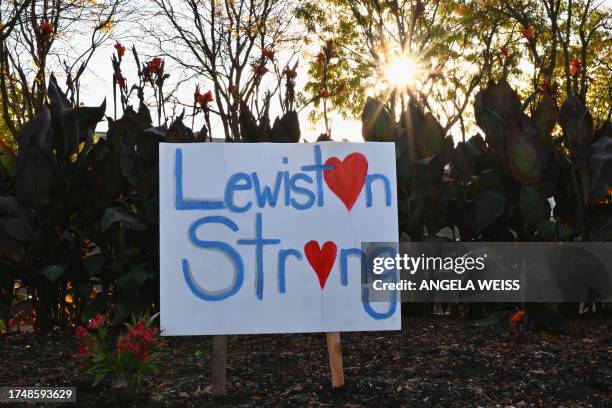 Sign reading "Lewiston Strong" is displayed in Lewiston, Maine, on October 27 in the aftermath of a mass shooting. Hundreds of police in the US state...
