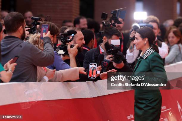 Juliette Binoche attends a red carpet for the movie "La Passion De Dodin Bouffant" during the 18th Rome Film Festival at Auditorium Parco Della...