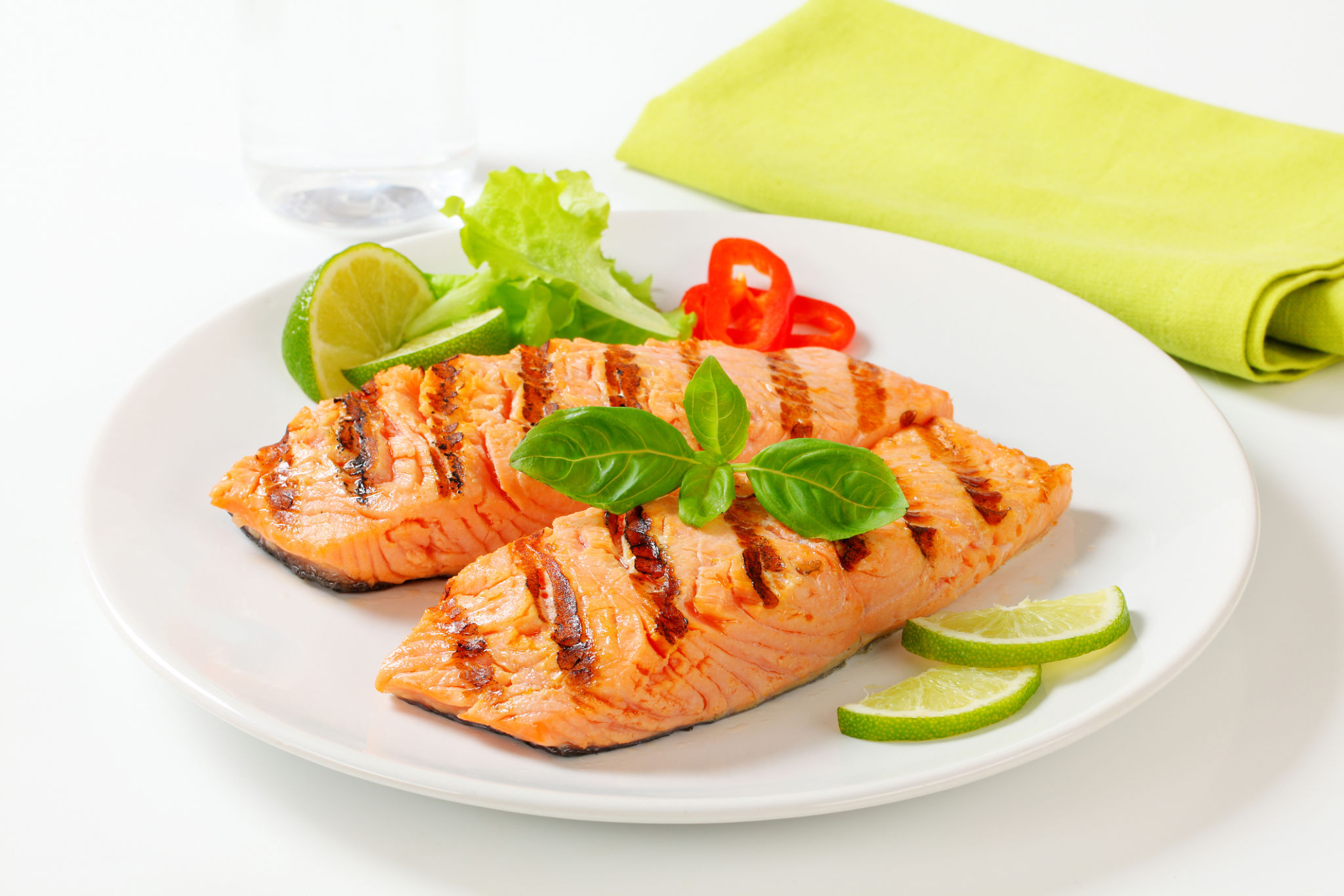 Grilled salmon steak on a plate. iron rich food Grilled salmon steak on a plate. iron rich food