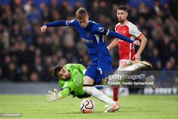 Cole Palmer of Chelsea misses a chance under pressure from David Raya of Arsenal during the Premier League match between Chelsea FC and Arsenal FC at...