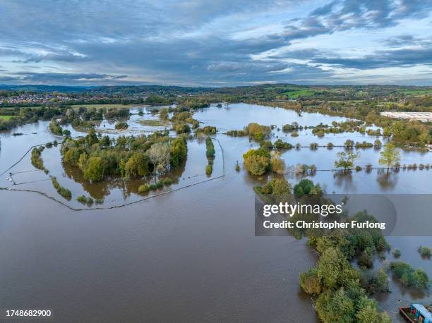 An aerial view of flooded fields near Derby rugby Club after the River Derwent burst its banks during storm Babet on October 21, 2023 in Derby,...