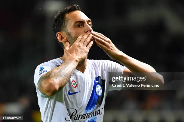 Hakan Calhanoglu of FC Internazionale celebrates after scoring the team's third goal during the Serie A TIM match between Torino FC and FC...