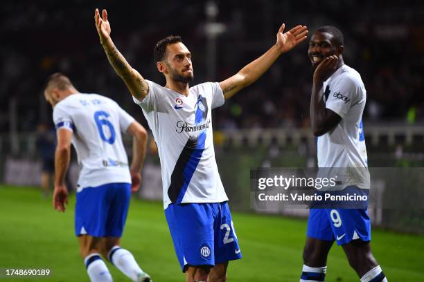 Hakan Calhanoglu of FC Internazionale celebrates after scoring the team's third goal during the Serie A TIM match between Torino FC and FC...