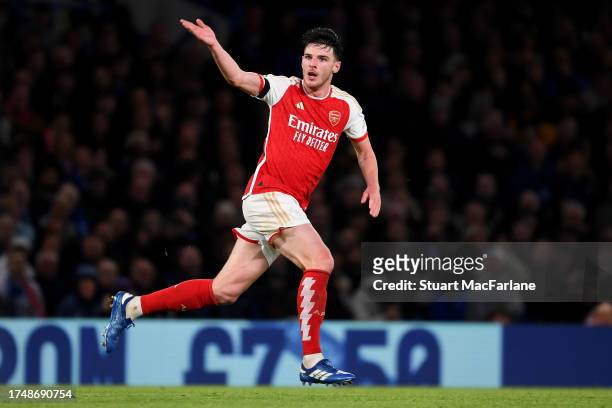 Declan Rice of Arsenal celebrates after scoring the team's first goal during the Premier League match between Chelsea FC and Arsenal FC at Stamford...