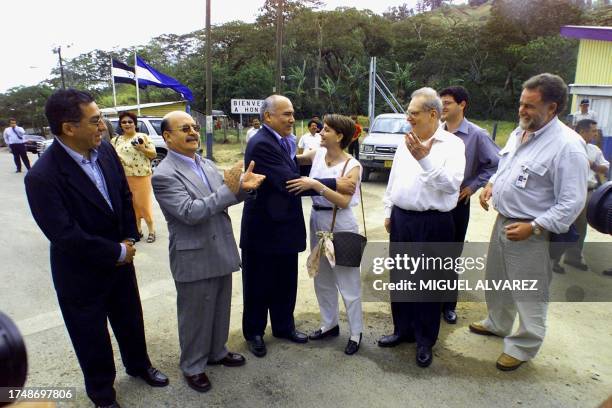 Honduran Vice-Chancellor Tomas Arita greets his Nicaraguan counterpart Bertha Arguello after meeting with Ambassador to the American States...