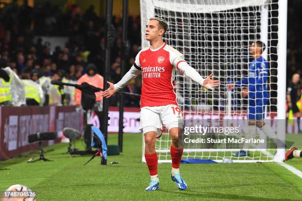 Leandro Trossard of Arsenal celebrates after scoring the team's second goal during the Premier League match between Chelsea FC and Arsenal FC at...