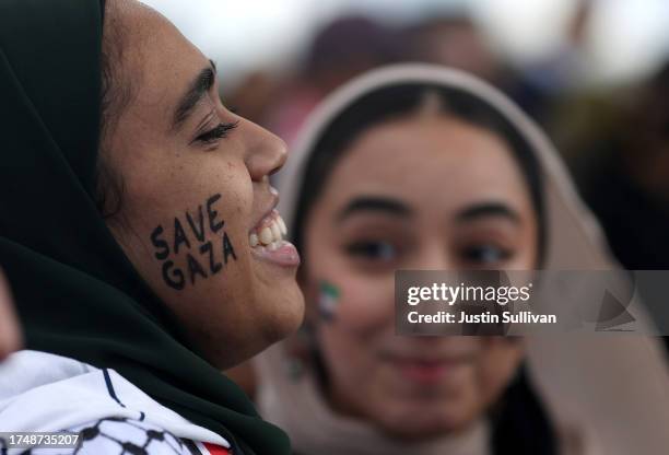 Pro-Palestinian protesters chant during a demonstration calling for a ceasefire in Gaza on October 21, 2023 in Washington, DC. Thousands of...