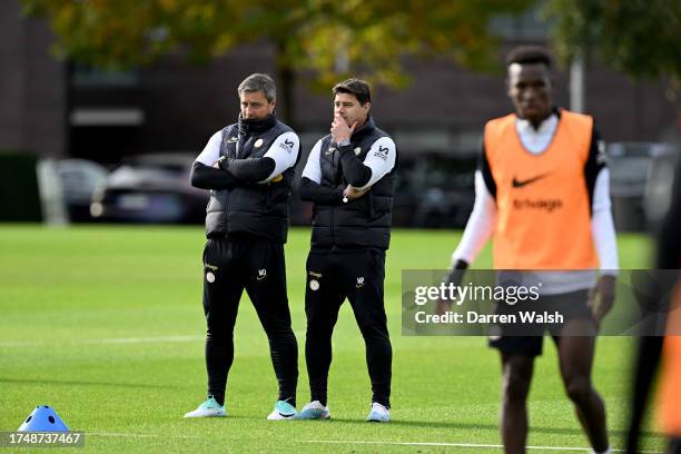 Assistant 1st Team Coach Miguel D'Agostino and Head Coach Mauricio Pochettino of Chelsea during a training session at Chelsea Training Ground on...