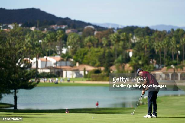 Jeremy Freiburghaus of Switzerland plays a shot on the 14th green during Day Three of the Estrella Damm N.A. Andalucía Masters at Real Club de Golf...