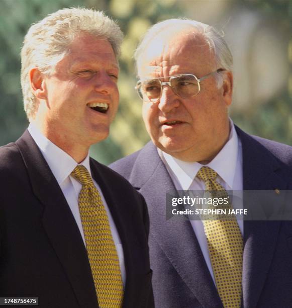 President Bill Clinton and Chancellor of the Federal Republic of Germany Helmut Kohl laugh after their joint press conference at San Souci Park 13...