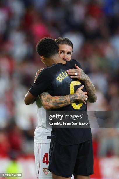 Sergio Ramos of Sevilla FC interacts with Jude Bellingham of Real Madrid after the LaLiga EA Sports match between Sevilla FC and Real Madrid CF at...