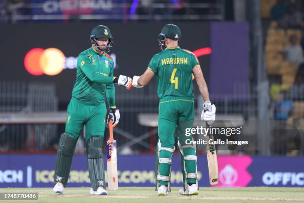 Heinrich Klaasen of South Africa and Aiden Markram of South Africa interact during the ICC Men's Cricket World Cup 2023 match between South Africa...