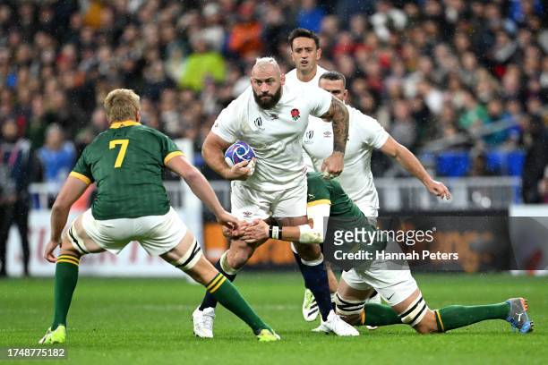 Joe Marler of England is tackled during the Rugby World Cup France 2023 match between England and South Africa at Stade de France on October 21, 2023...