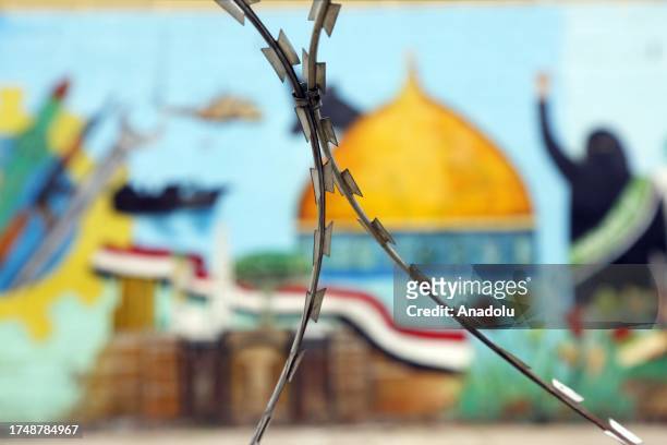 View of a mural depicting Dome of the Rock as thousands stage a protest against Israeli attacks on Gaza and Al-Aqsa Mosque following the Friday...