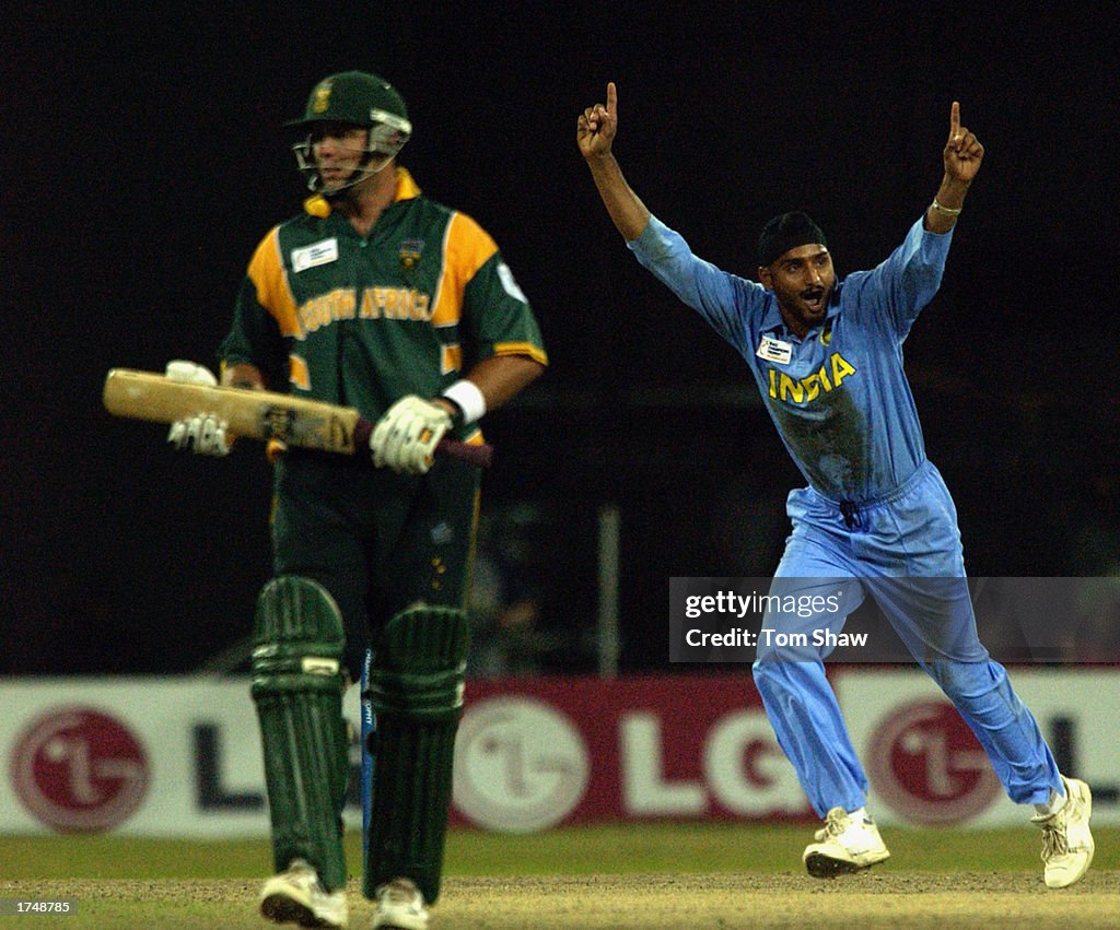 Harbhajan Singh of India celebrates the wicket of Boeta Dippenaar of South Africa