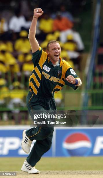 Allan Donald of South Africa celebrates the wicket of VVS Laxman of India during the ICC Champions Trophy semi-final match between India and South...