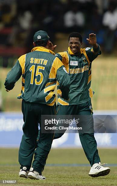 Makhaya Ntini of South Africa celebrates the wicket of Sourav Ganguly of India during the ICC Champions Trophy semi-final match between India and...