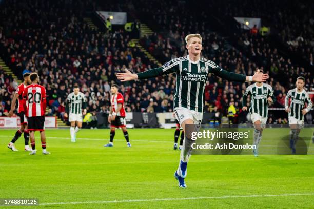 Scott McTominay of Manchester United celebrates after scoring their sides first goal during the Premier League match between Sheffield United and...