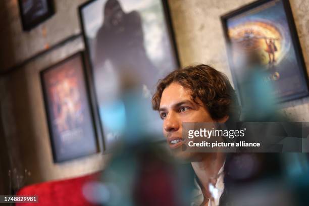 October 2023, Bavaria, Munich: Joseph Baena, actor and son of A. Schwarzenegger, sits during an interview at the premiere of the sixth season of the...