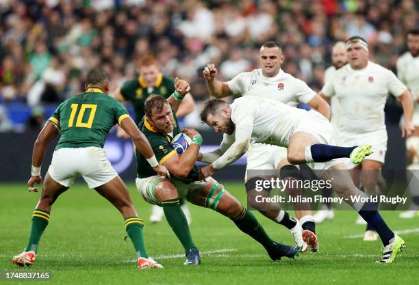 Duane Vermeulen of South Africa is tackled by Elliot Daly of England during the Rugby World Cup France 2023 match between England and South Africa at...